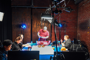 Online one-shot game with Logomancy