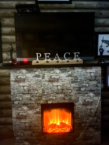 P E A C E Cast Iron Stocking Holders