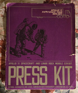055.)   Apollo 11 Lunar Rock Press Kit