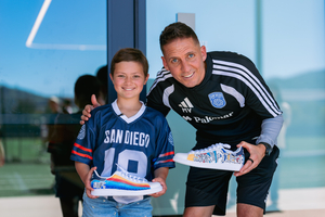 Support Layla & get Coach Mikey’s Game-Worn Shoes