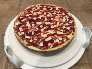 White Chocolate Raspberry Swirl Cheesecake