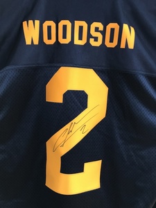 Charles Woodson Autographed Jersey