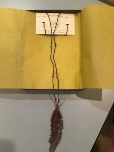 Up-cycled leather feather necklace