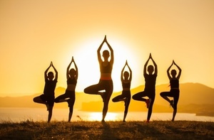 Group children are engaged yoga with trainer ocean 110955 452 s300