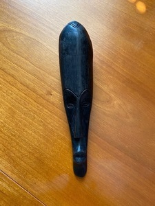 Hand-carved wooden bottle opener