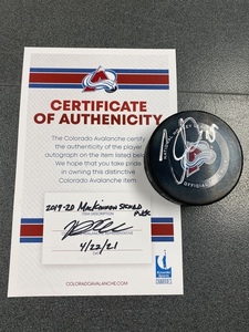 Colorado Avalanche Puck signed by Nathan Mackinnon