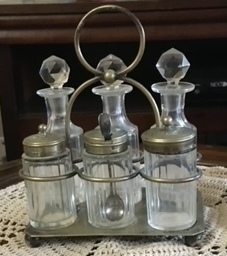 Small silver plated,  glass antique cruet set