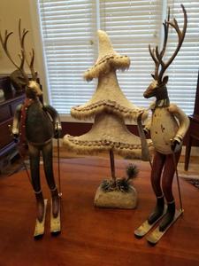 017 Metal deer on skis and snow tree