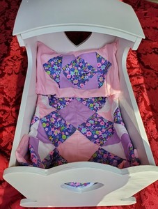 A Baby Doll With Cradle and Quilt Item#028